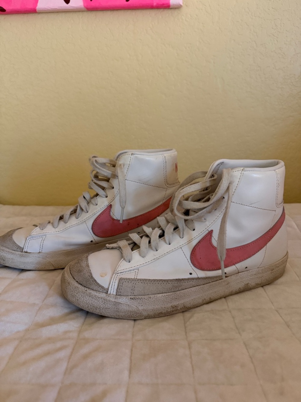 Nike White High-Top Sneakers with Pink Swoosh